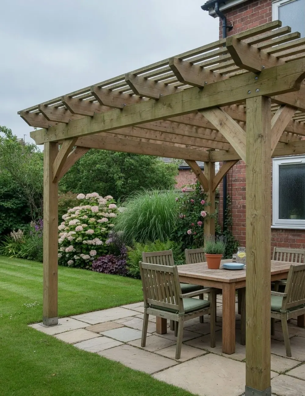 Timber pergola over a garden seating area